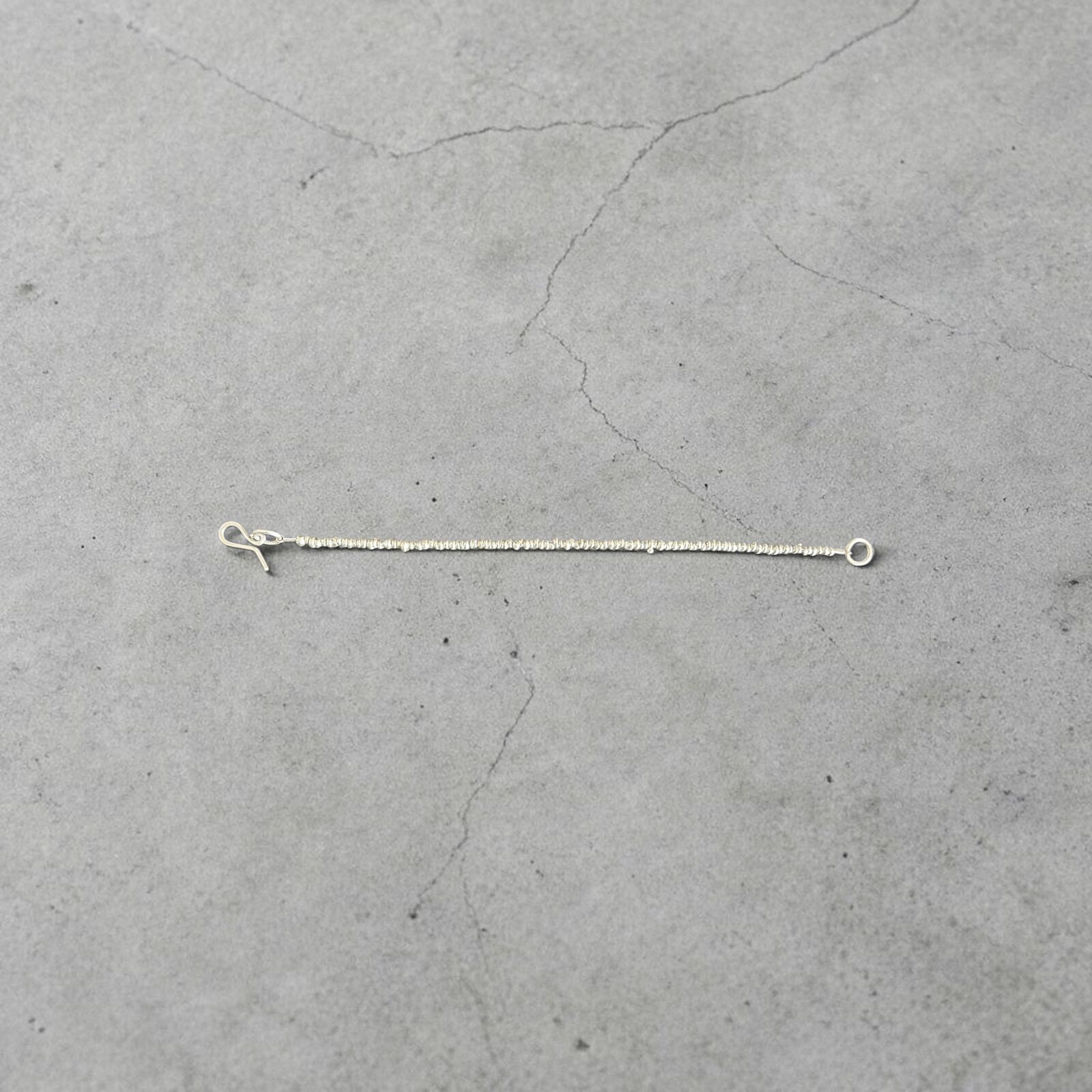 raml silver bead bracelet, laid flat
